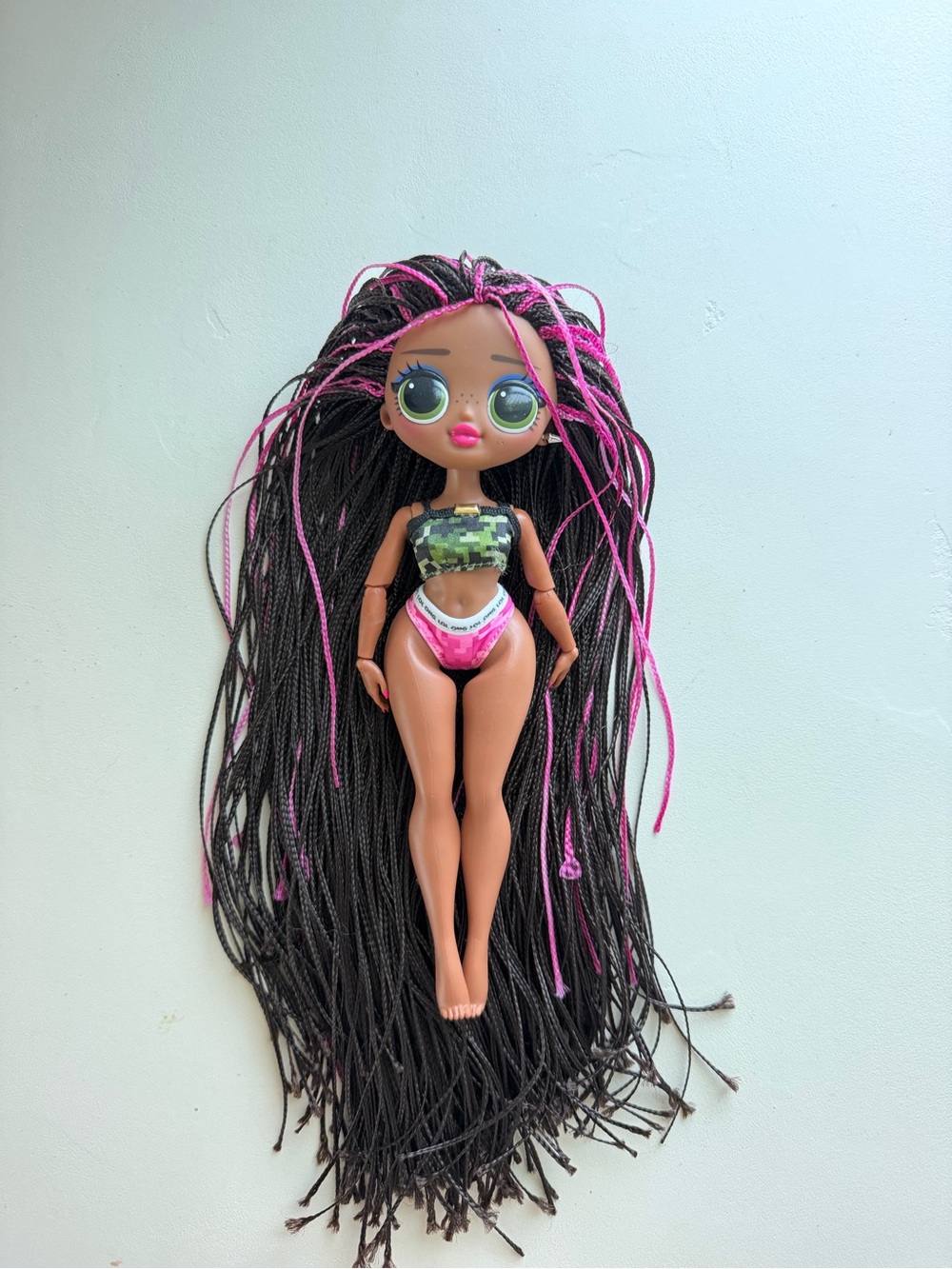 L.O.L. Surprise! Doll with Black & Pink Braided Hair and Green Eyes